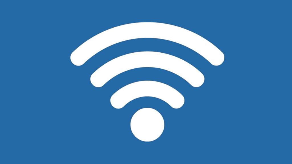 Moderne wifi-router op een plank in een lichte woonkamer